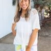 Boutique Simplified Spirited Front Tie Top In White Tops