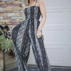 Boutique Simplified Floral Tracks Jumpsuit Jumpsuits 11 Boutique Simplified Floral Tracks Jumpsuit Jumpsuits